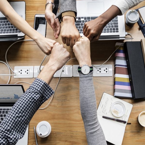 Colleagues giving a fist bump